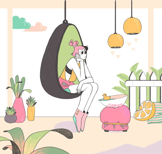 Person swinging in an avocado shaped hanging chair.